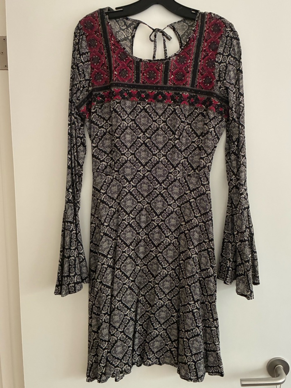 Black and Magenta Dress with Embroidered accents.